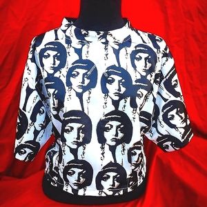 All over print of faces on crop top